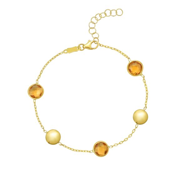 Bracelet chaîne en or jaune 14k avec pastilles et topazes bleues