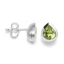 14 Karat white gold earrings Pear shape 2 pear-cut peridots Post and butterfly clasp Made in Montreal
