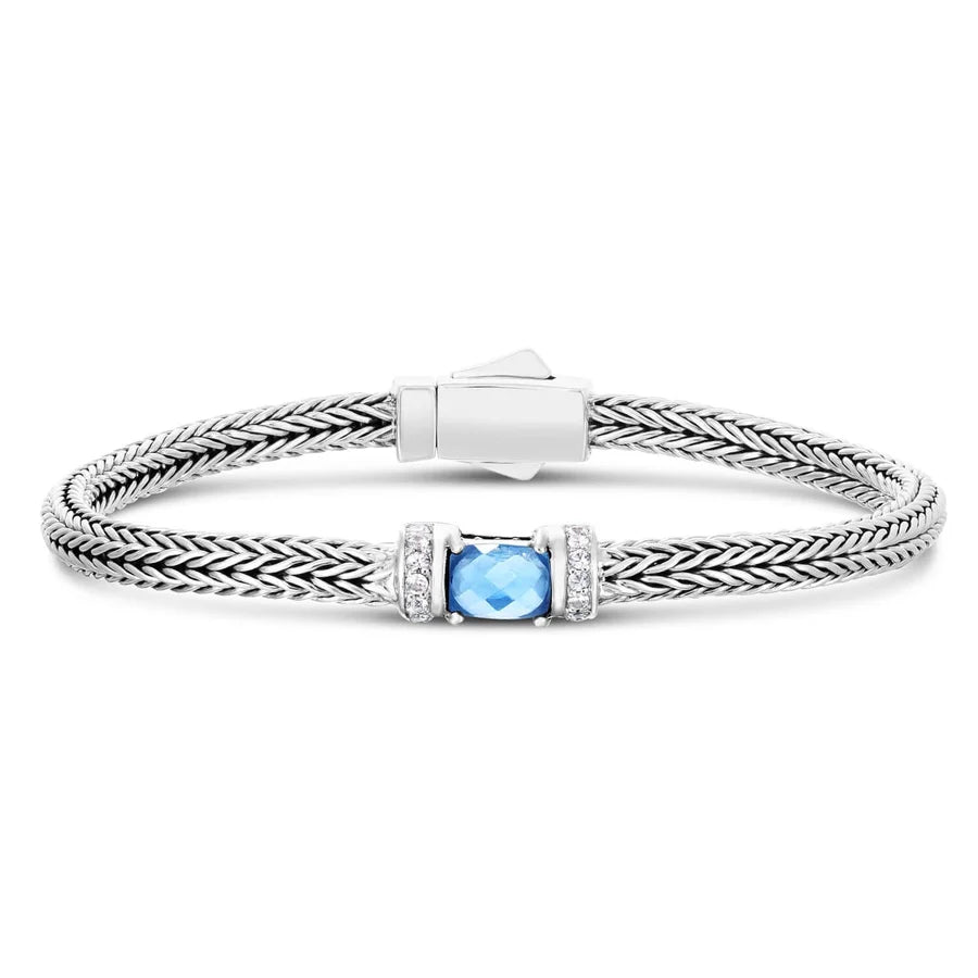 Bracelet tressé en argent sterling avec topaze bleue et saphirs blancs