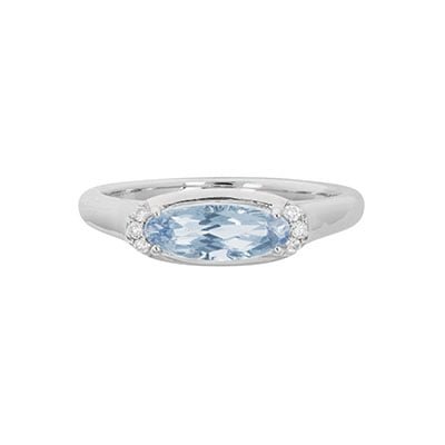 14 Karat white gold ladies' ring set with an oval-shaped Aquamarine and 0.05 carats of diamonds