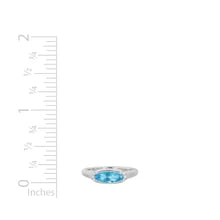 14 Karat white gold ladies' ring set with an oval-shaped Aquamarine and 0.05 carats of diamonds