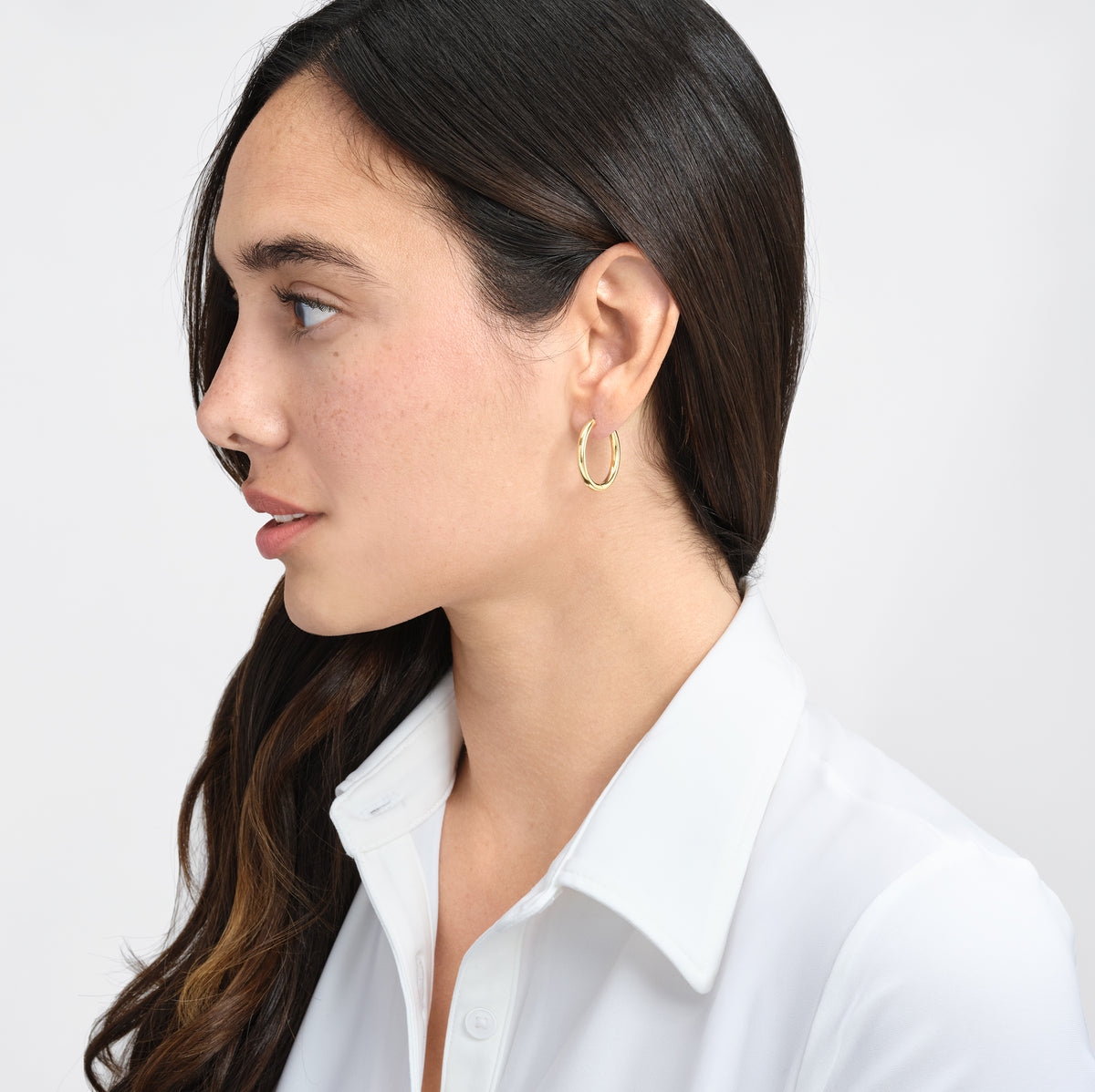 Boucles d'oreilles Huggies ovales 20 x 15 mm en or jaune 14k