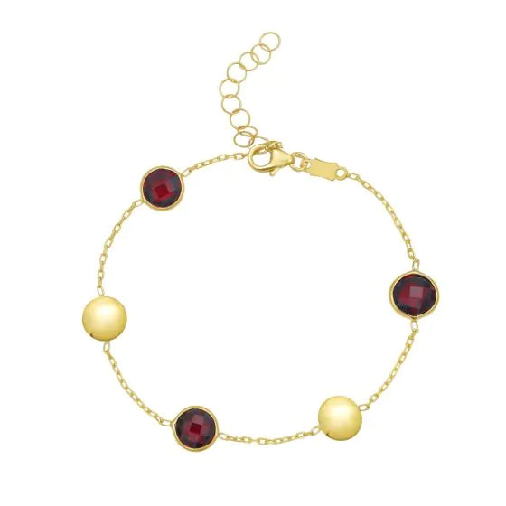 Bracelet chaîne en or jaune 14k avec pastilles et topazes bleues