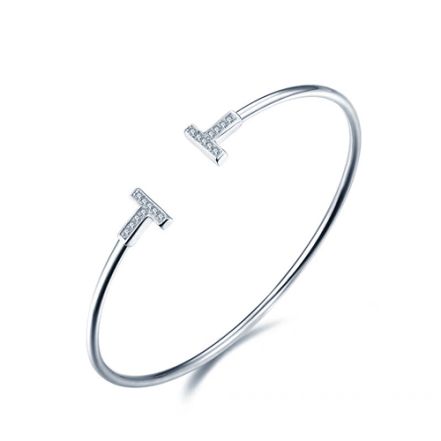 Bracelet de type bangle ouvert en or blanc 14k serti de diamants